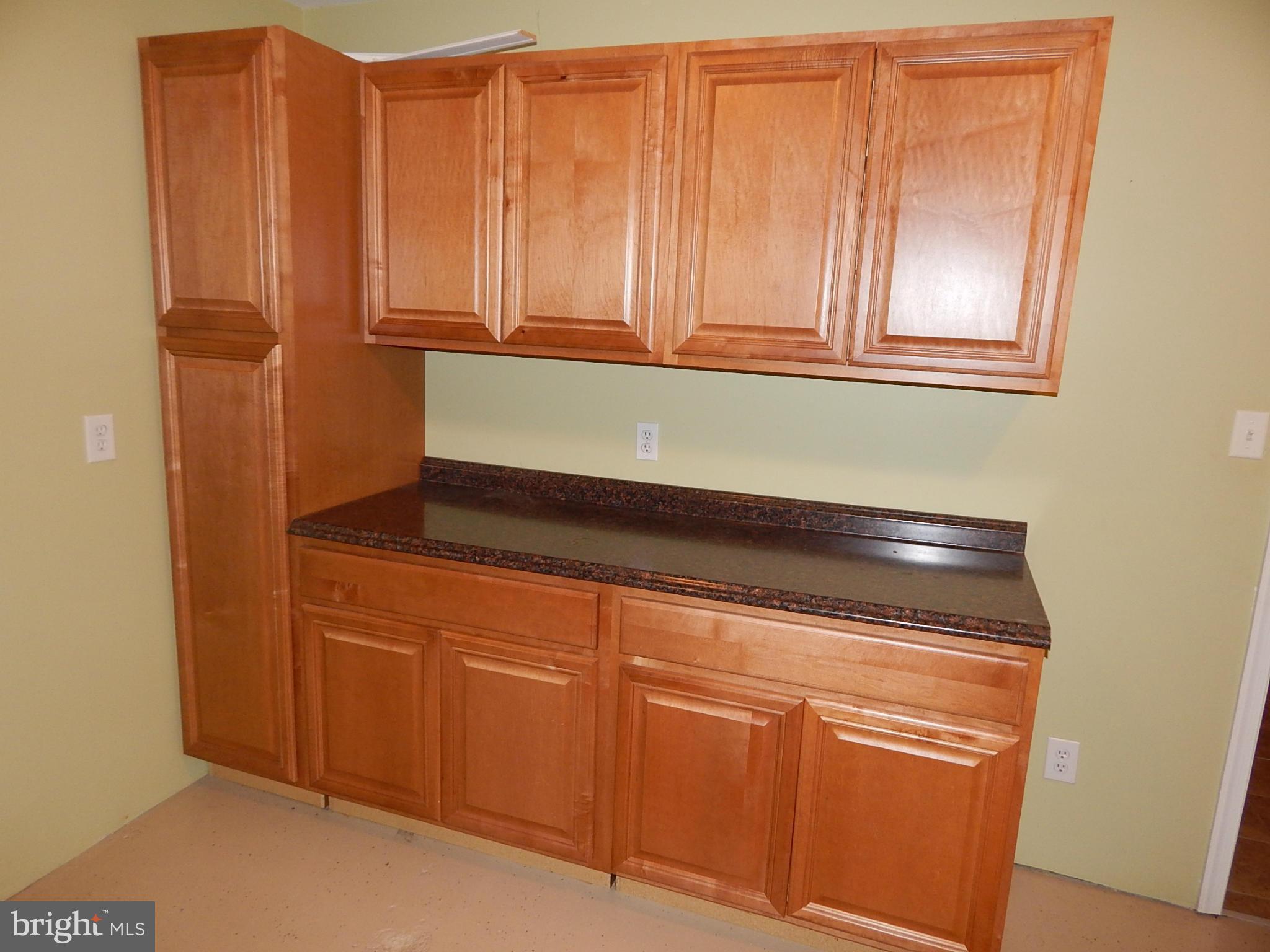 1615 Lottie Fowler Road Prince Frederick, MD 20678 - Photo 19 of 29 a close view of wooden cabinets