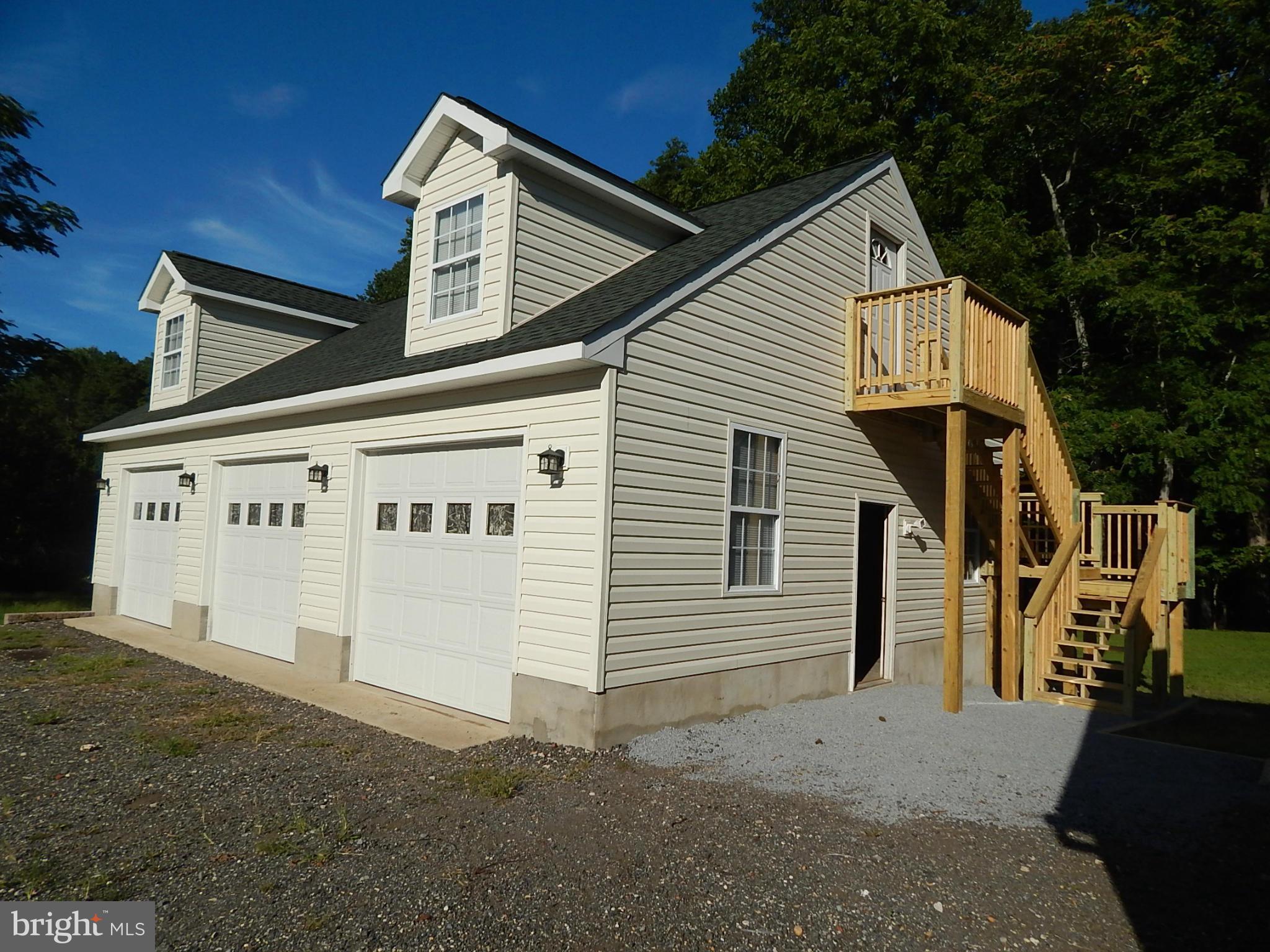 1615 Lottie Fowler Road Prince Frederick, MD 20678 - Photo 28 of 29 a view of a house with a garage
