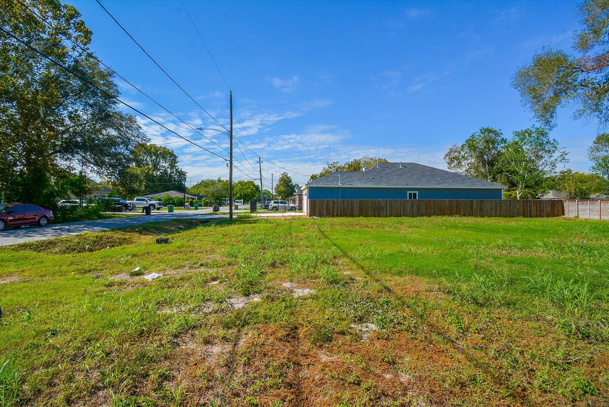 4607 Larkspur Street Houston, TX 77051 - Photo 11 of 18 a front view of a house with garden