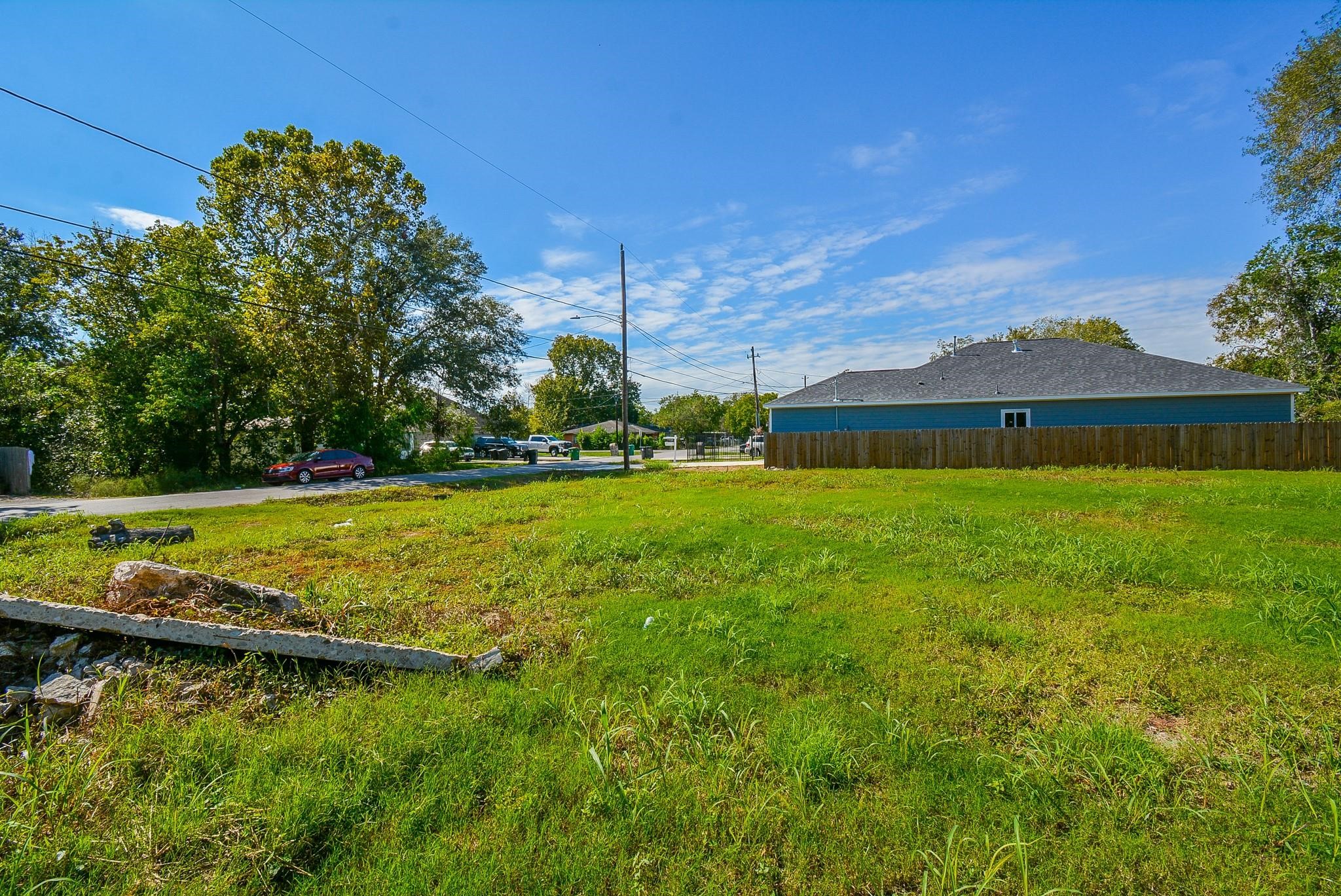 4607 Larkspur Street Houston, TX 77051 - Photo 13 of 18 a view of yard with swimming pool and green space