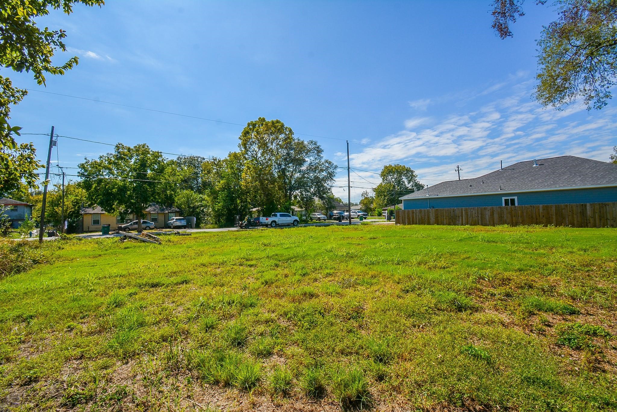 4607 Larkspur Street Houston, TX 77051 - Photo 14 of 18 a view of a house with a yard