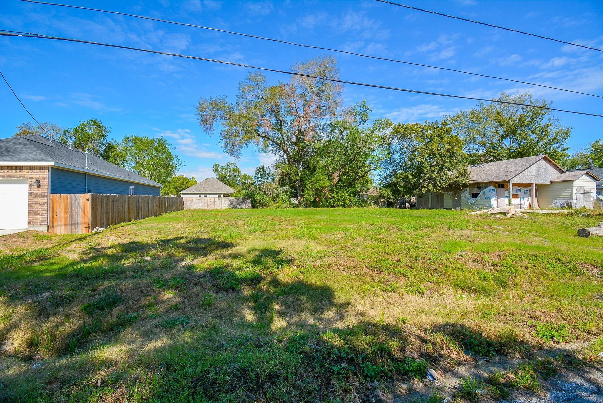 4607 Larkspur Street Houston, TX 77051 - Photo 17 of 18 a view of a house with a yard
