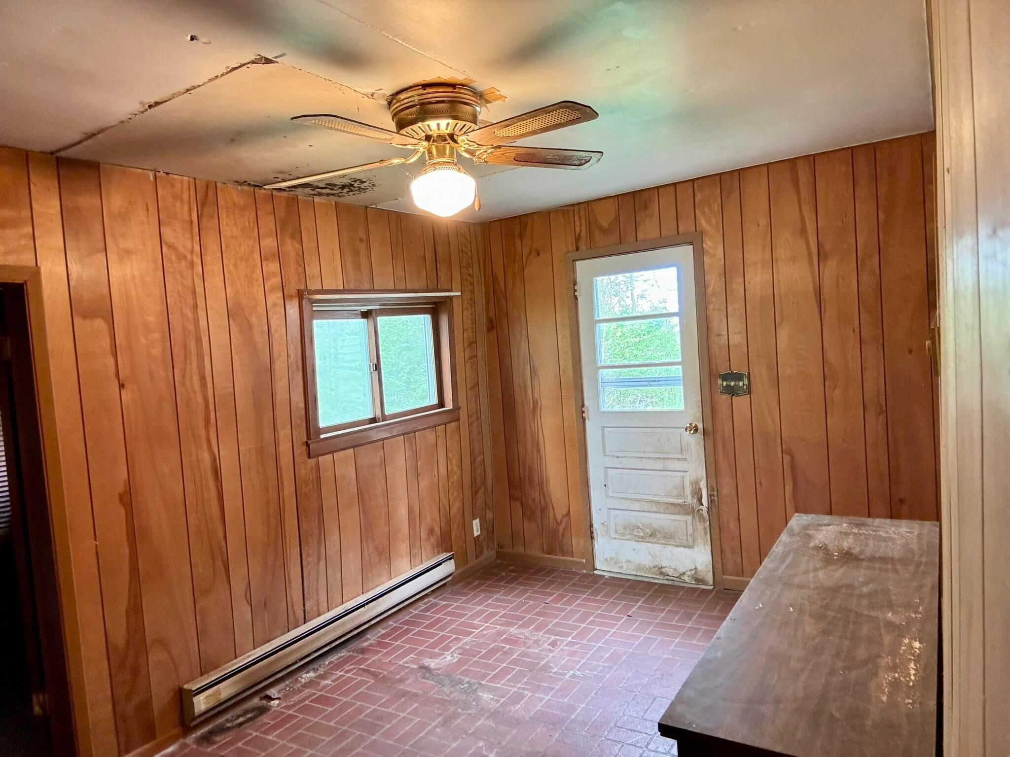 2190 Rosedale Road Irwin, OH 43029 - Photo 7 of 42 Large mud room with laundry hookup. Vinyl flooring. Door to side deck by garage.