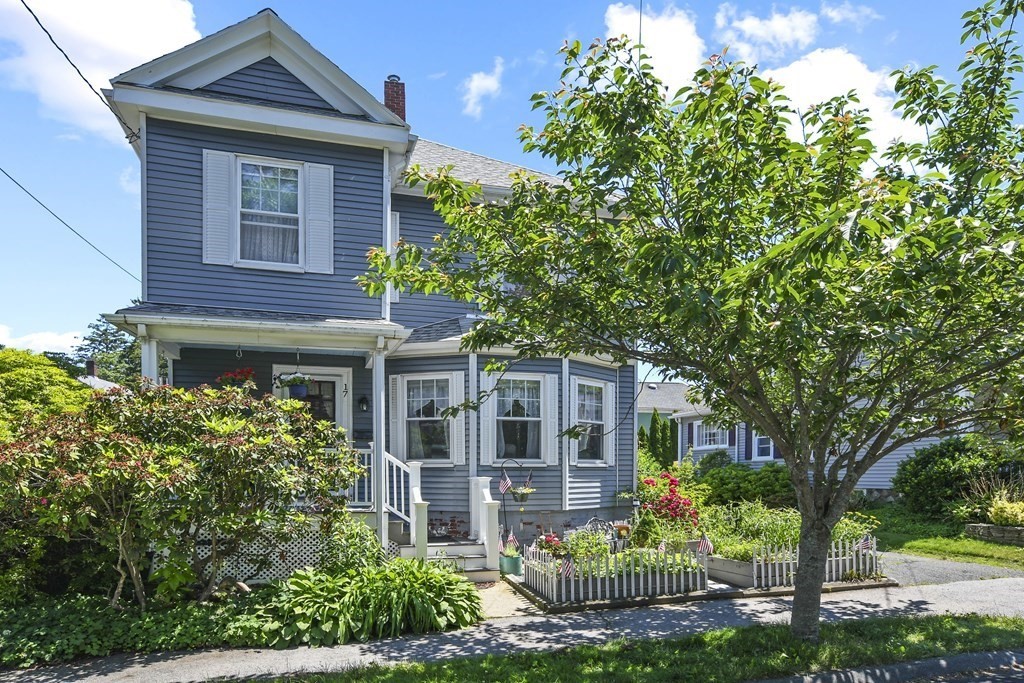 17 Trask Street Danvers, MA 01923 - Photo 1 of 29 a front view of a house with a yard