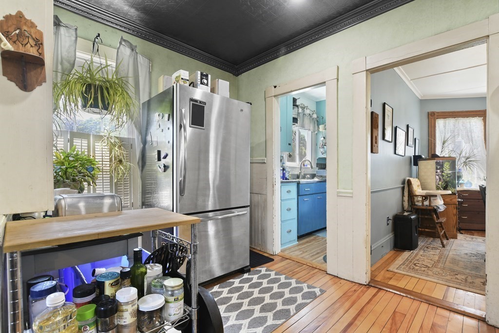17 Trask Street Danvers, MA 01923 - Photo 10 of 29 a kitchen with stainless steel appliances granite countertop a refrigerator and a sink