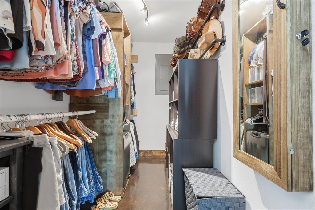 1748 Wilson Road Palmer, TX 75152 - Photo 14 of 40 a view of walk in closet with clothes and shoes