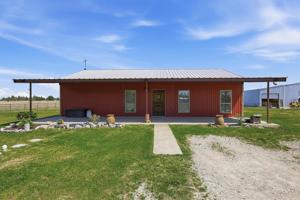 1748 Wilson Road Palmer, TX 75152 - Photo 38 of 40 a view of a house with a yard