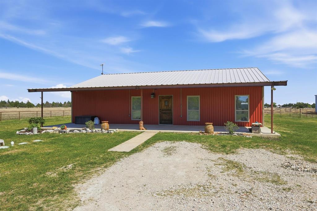 1748 Wilson Road Palmer, TX 75152 - Photo 40 of 40 a front view of a house with a yard