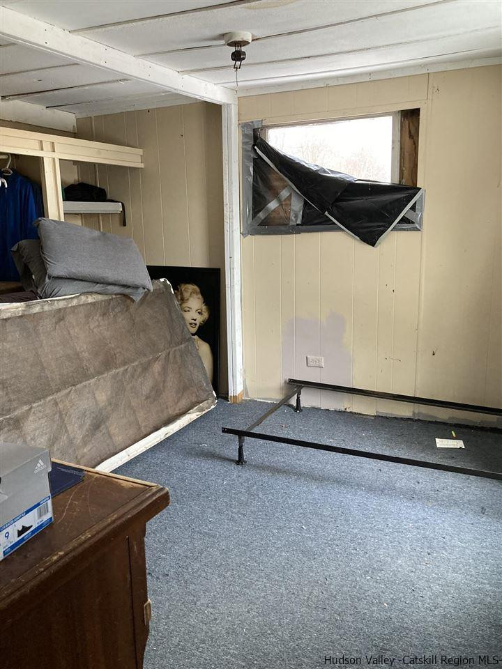 10 Edward Road Milton, NY 12547 - Photo 11 of 16 a living room with a couch and a ceiling fan