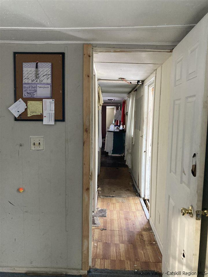 10 Edward Road Milton, NY 12547 - Photo 7 of 16 a view of a hallway with wooden floor and staircase