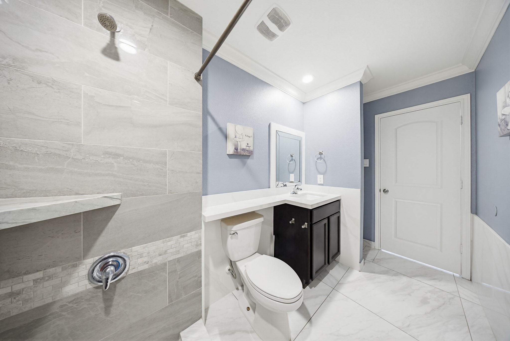 23210 Barberry Crk Trail Spring, TX 77373 - Photo 6 of 33 a bathroom with a sink toilet and shower