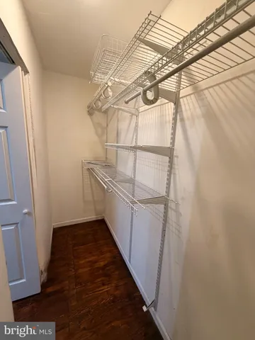 a view of a room with racks on the wall