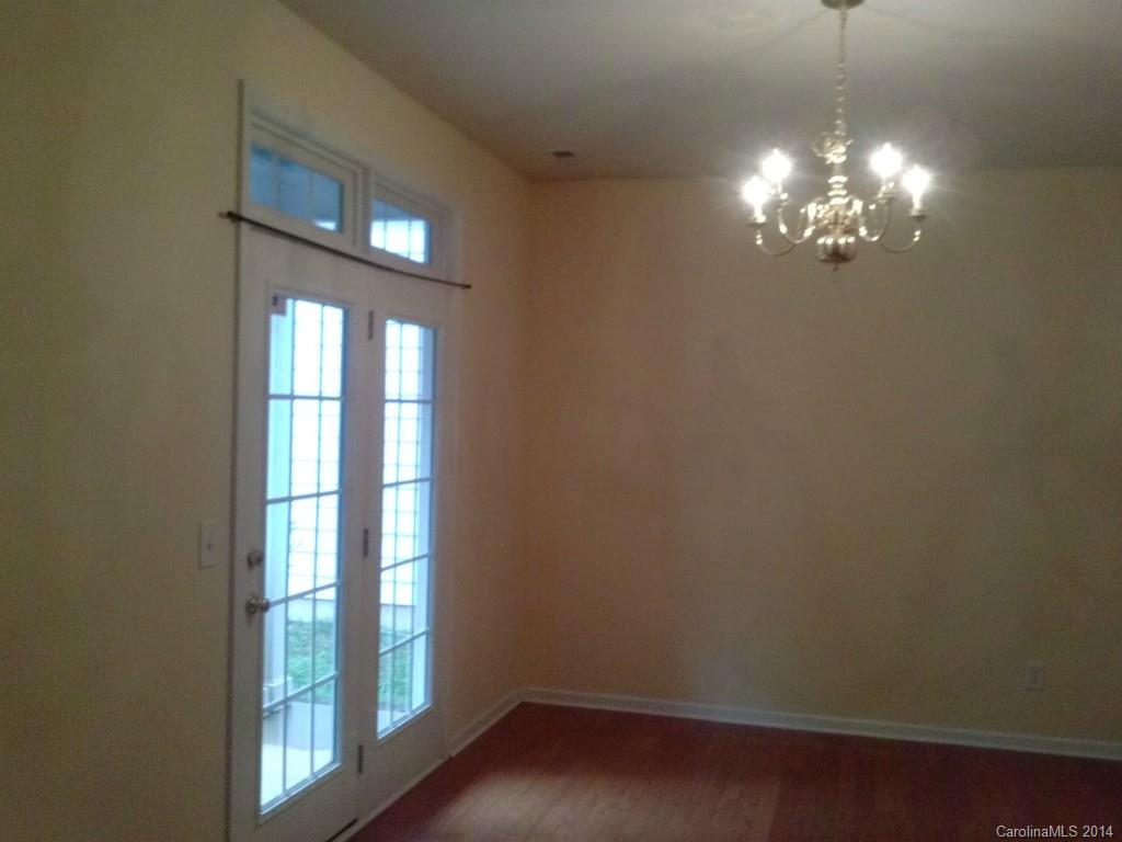 219 Faust Road Davidson, NC 28036 - Photo 4 of 12 a view of a livingroom with window
