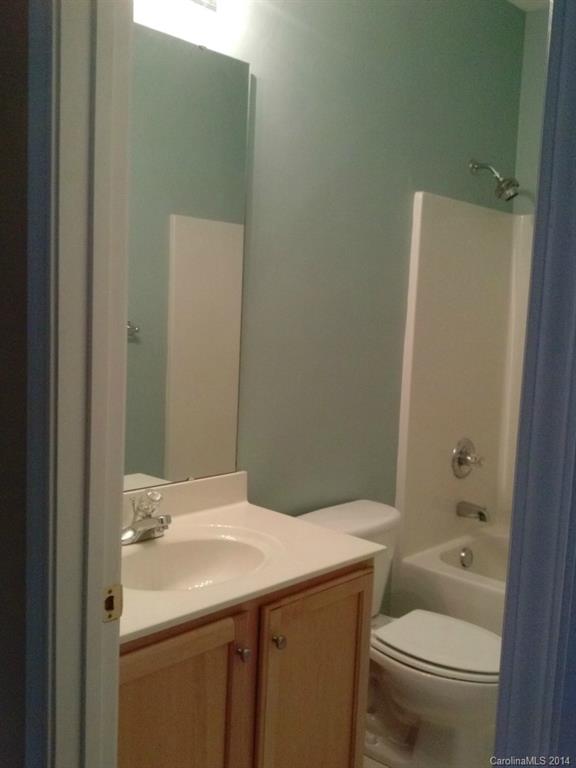 219 Faust Road Davidson, NC 28036 - Photo 5 of 12 a bathroom with a sink toilet and shower