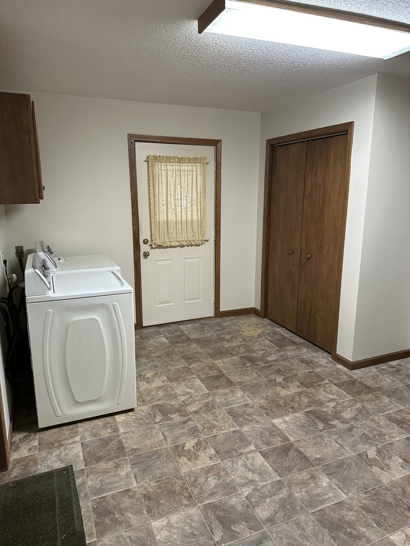 22934 Prophet Road Rock Falls, IL 61071 - Photo 18 of 34 a view of a utility room with dryer and washer