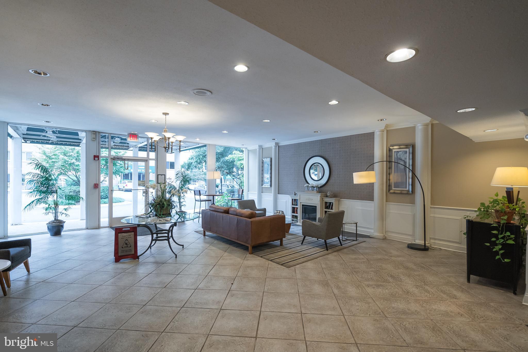 10570 Main Street, Unit 524 Fairfax, VA 22030 - Photo 5 of 19 a living room with furniture window and outdoor view