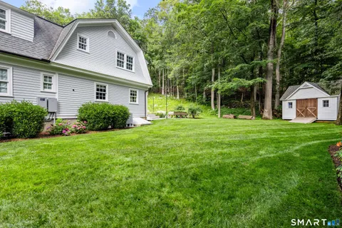 a view of a yard in front of house