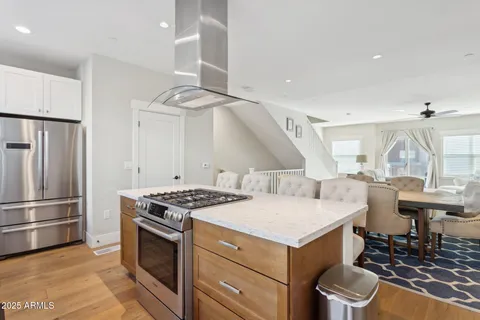 a picture of a bench in front of a wall