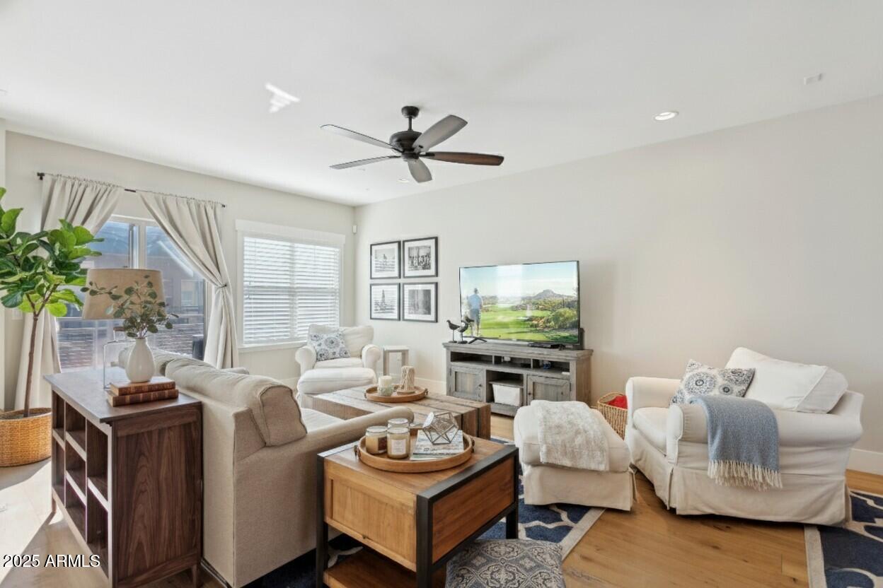 1400 East Bethany Home Road, Unit 22 Phoenix, AZ 85014 - Photo 17 of 46 a living room with furniture and a large window