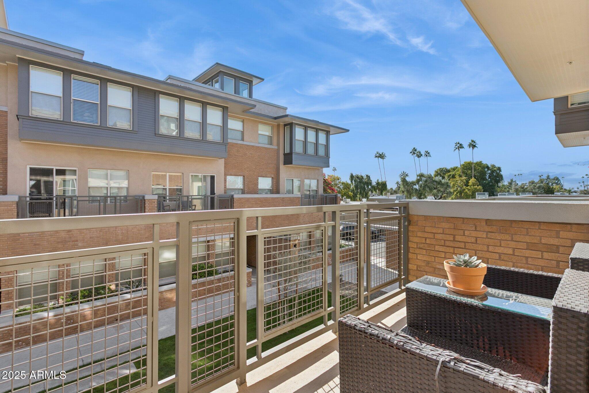 1400 East Bethany Home Road, Unit 22 Phoenix, AZ 85014 - Photo 19 of 46 a view of roof deck with outdoor seating and city view