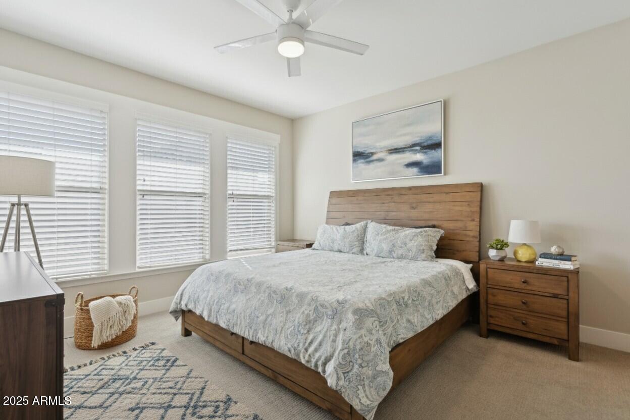 1400 East Bethany Home Road, Unit 22 Phoenix, AZ 85014 - Photo 24 of 46 a bedroom with a bed and a window