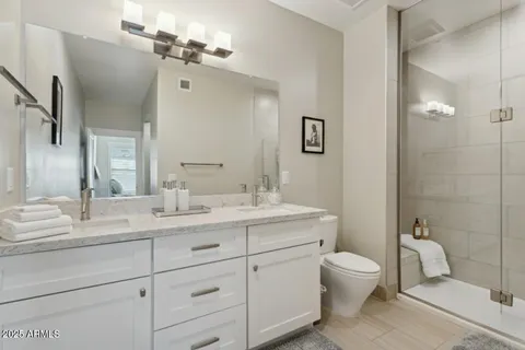 a bathroom with a sink and mirror
