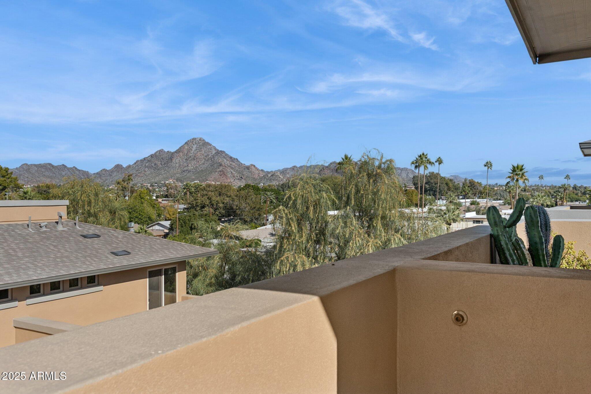1400 East Bethany Home Road, Unit 22 Phoenix, AZ 85014 - Photo 31 of 46 a view of a city from a balcony