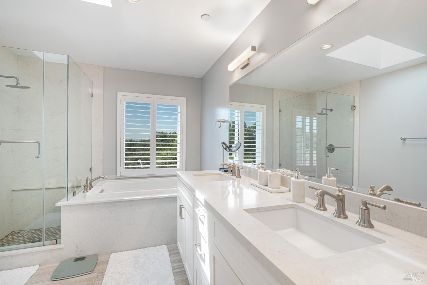 4414 Bally Bunion Lane Santa Rosa, CA 95403 - Photo 11 of 18 a bathroom with a sink double vanity mirror and a toilet