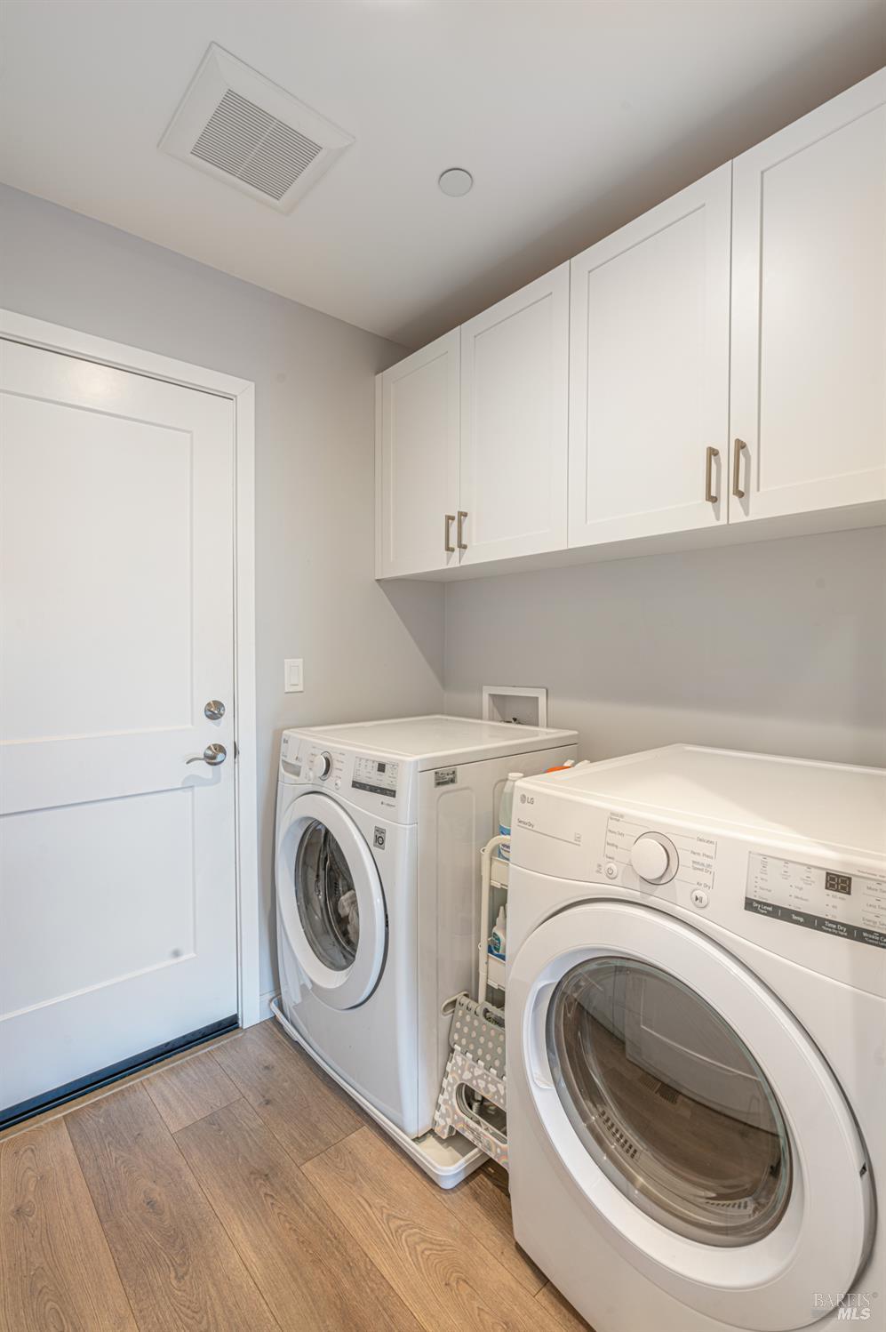 4414 Bally Bunion Lane Santa Rosa, CA 95403 - Photo 13 of 18 a utility room with dryer and washer