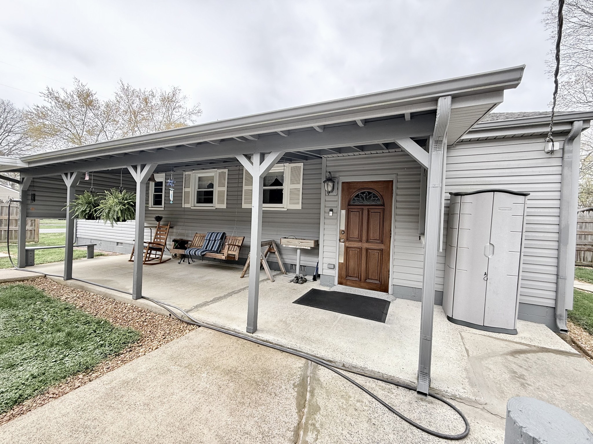 111 Gentry Street Tullahoma, TN 37388 - Photo 11 of 66 a backyard of a house with seating space
