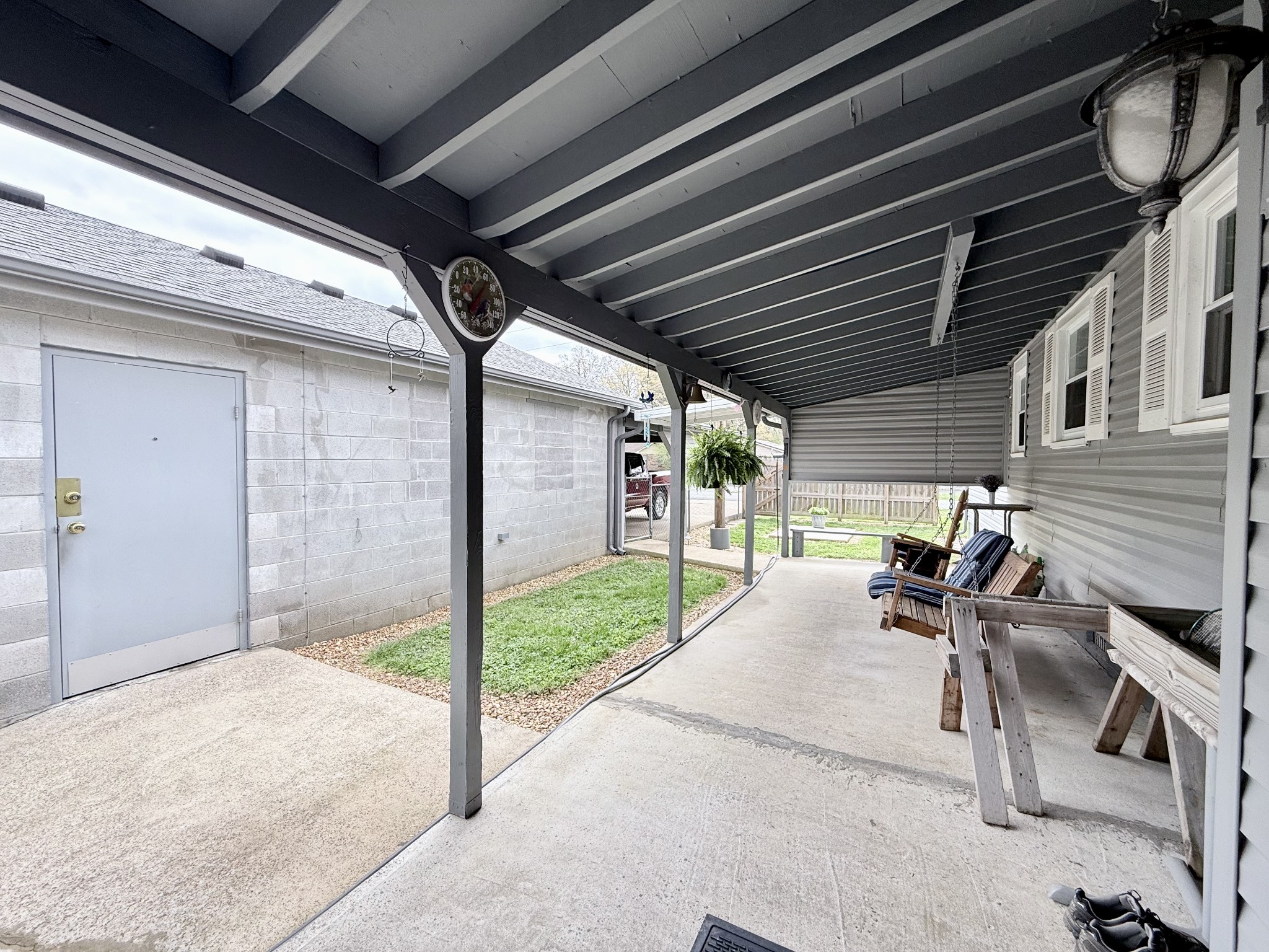 111 Gentry Street Tullahoma, TN 37388 - Photo 13 of 66 a view of a porch with furniture and garden
