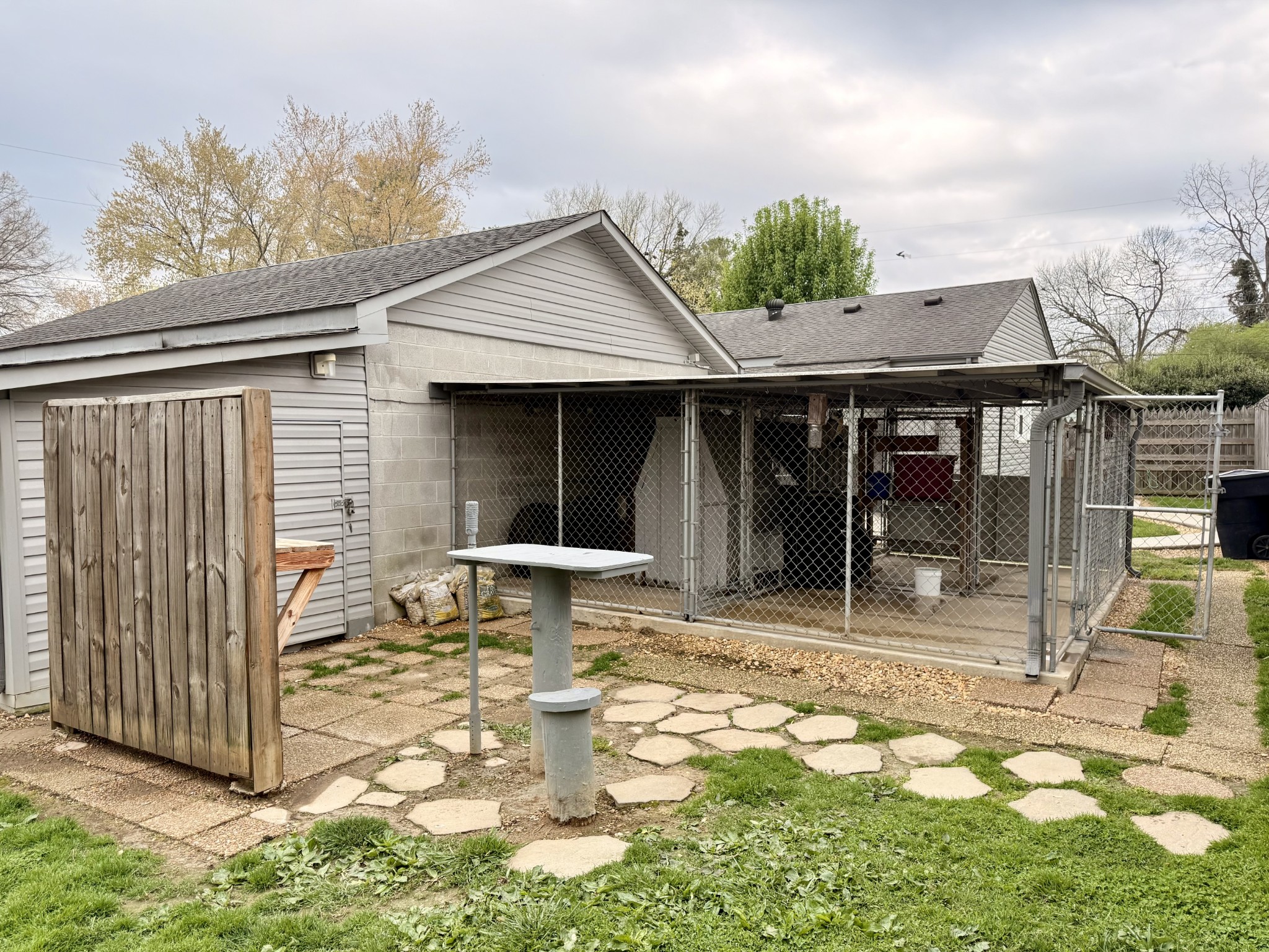 111 Gentry Street Tullahoma, TN 37388 - Photo 19 of 66 a backyard of a house with yard and outdoor seating
