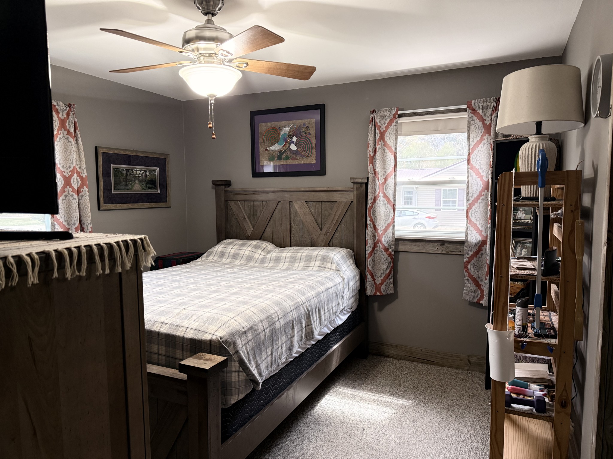 111 Gentry Street Tullahoma, TN 37388 - Photo 30 of 66 a bed sitting in a bedroom next to a window