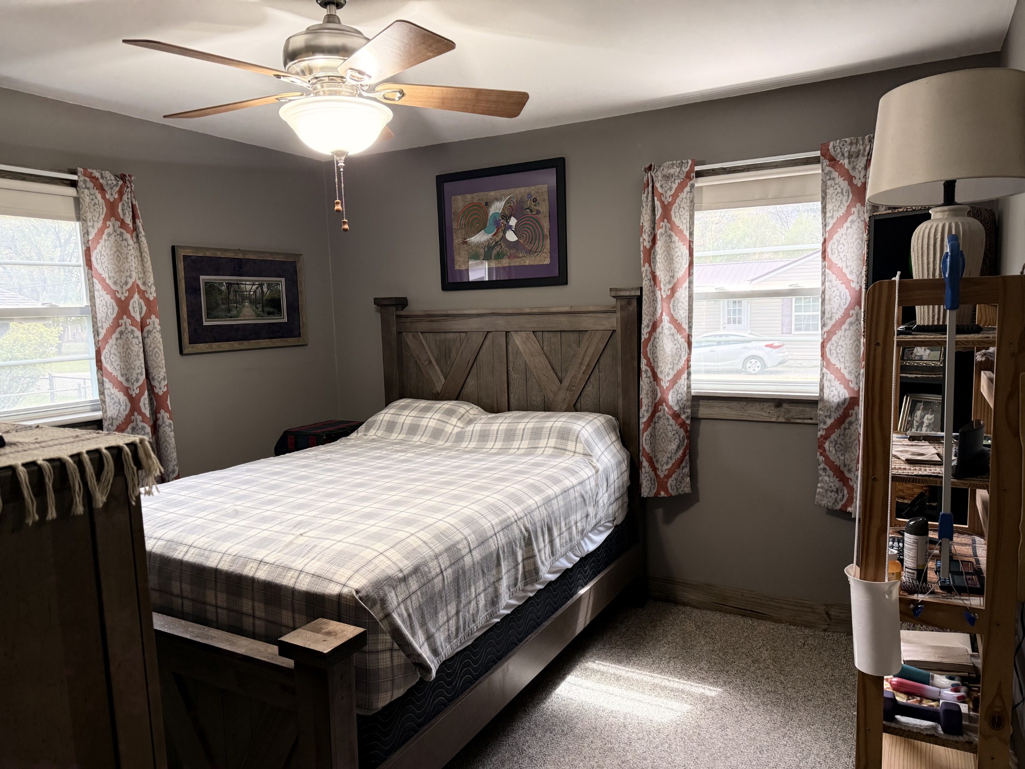 111 Gentry Street Tullahoma, TN 37388 - Photo 32 of 66 a bed sitting in a bedroom next to a window