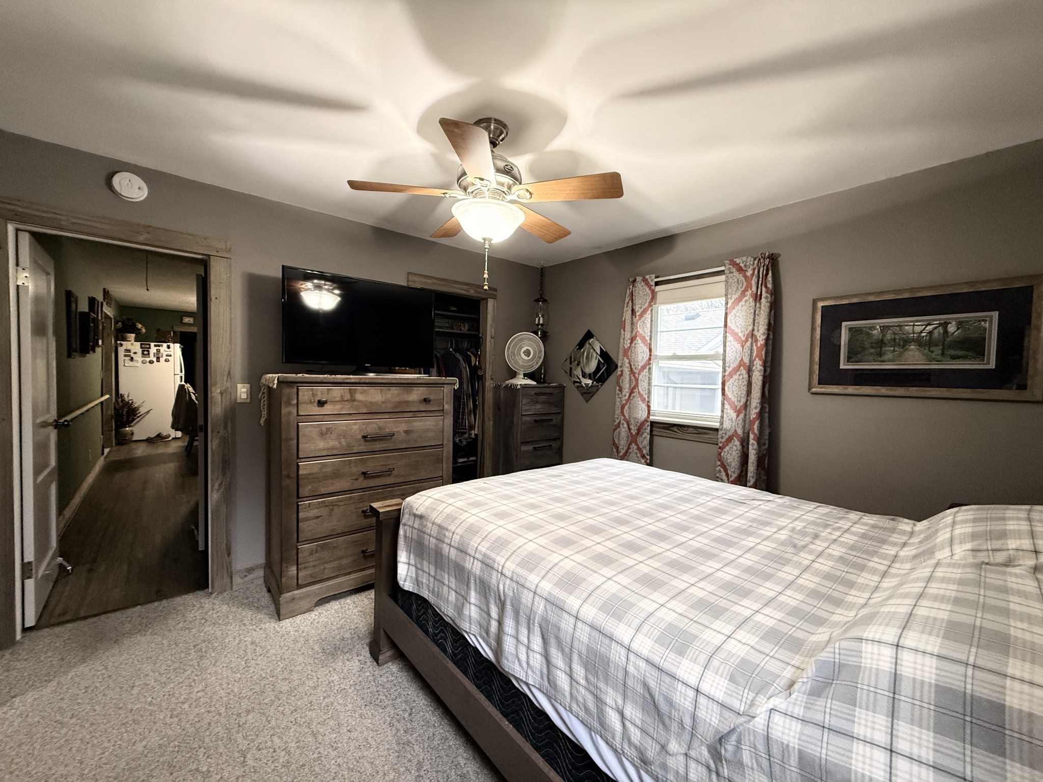 111 Gentry Street Tullahoma, TN 37388 - Photo 33 of 66 a bedroom with a bed and a chandelier