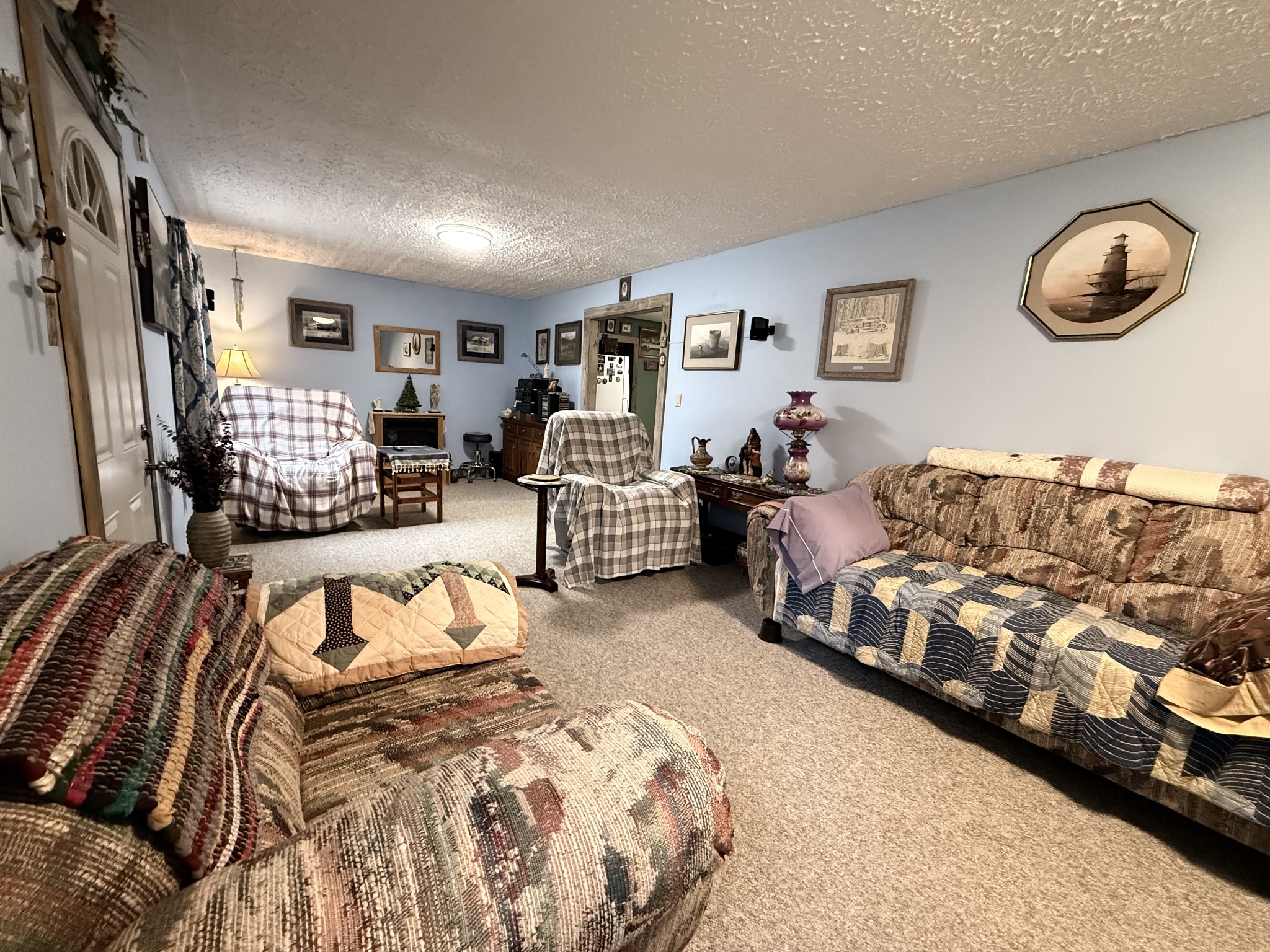 111 Gentry Street Tullahoma, TN 37388 - Photo 46 of 66 a bedroom with furniture and a large mirror
