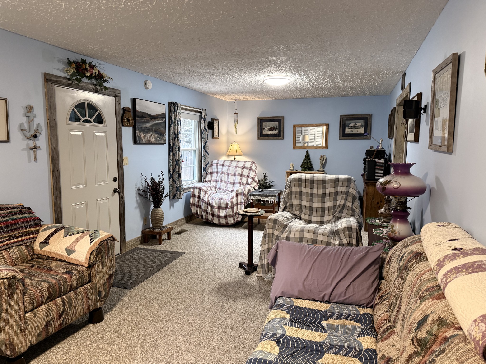 111 Gentry Street Tullahoma, TN 37388 - Photo 47 of 66 a bedroom with furniture and a wooden floor