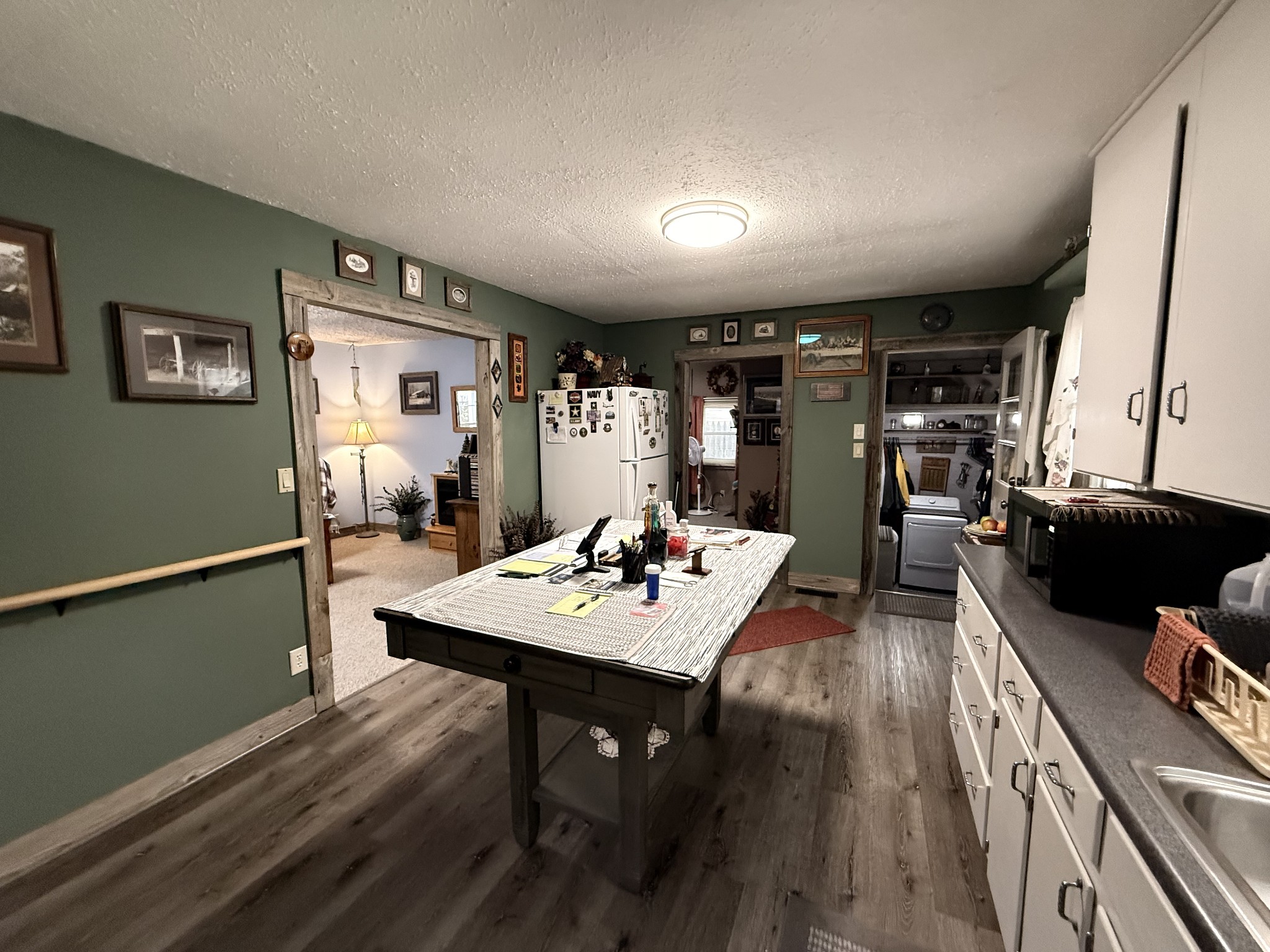 111 Gentry Street Tullahoma, TN 37388 - Photo 57 of 66 a view of a workspace with furniture and a kitchen