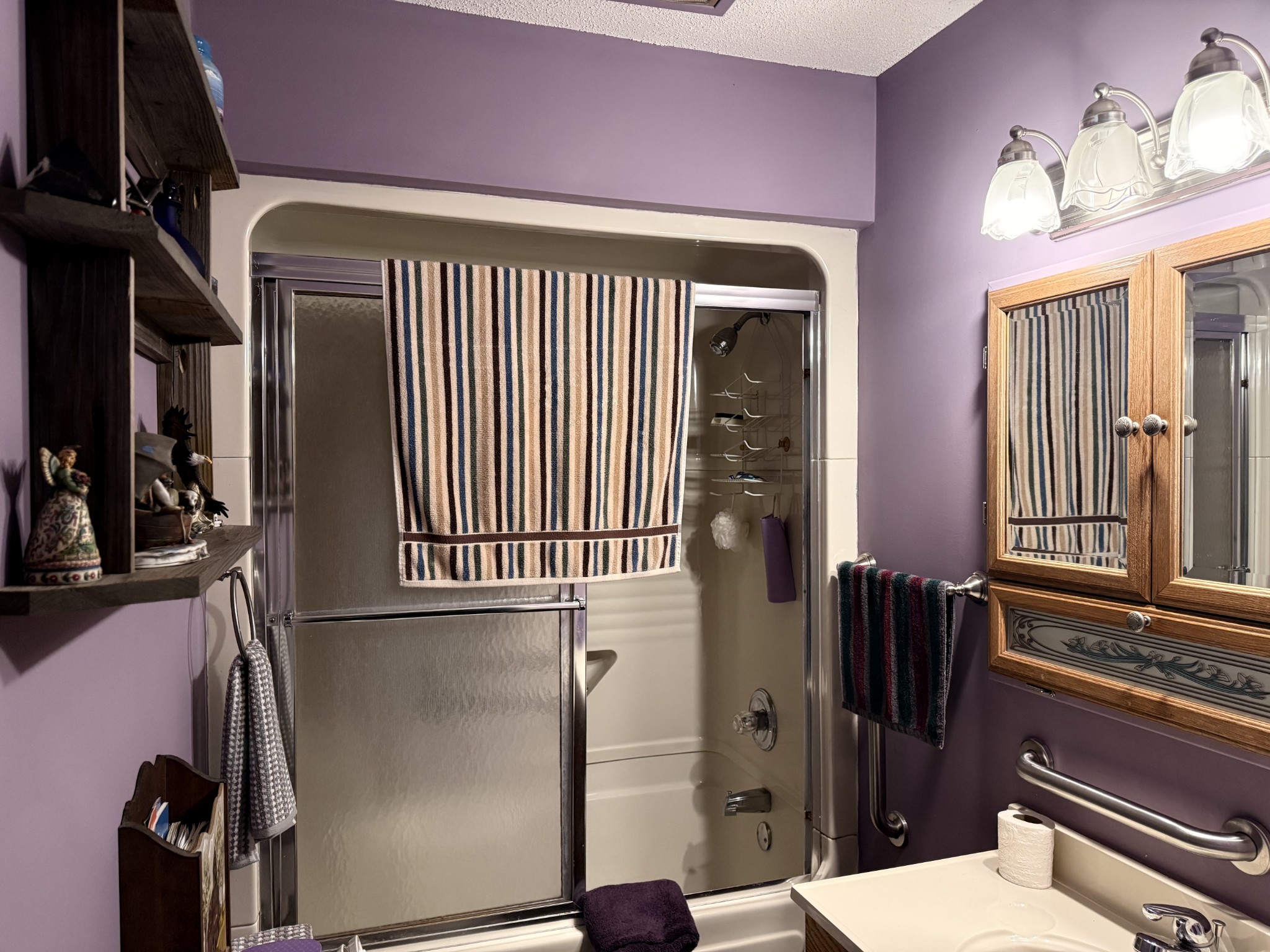 111 Gentry Street Tullahoma, TN 37388 - Photo 58 of 66 a bathroom with a toilet sink and a shower