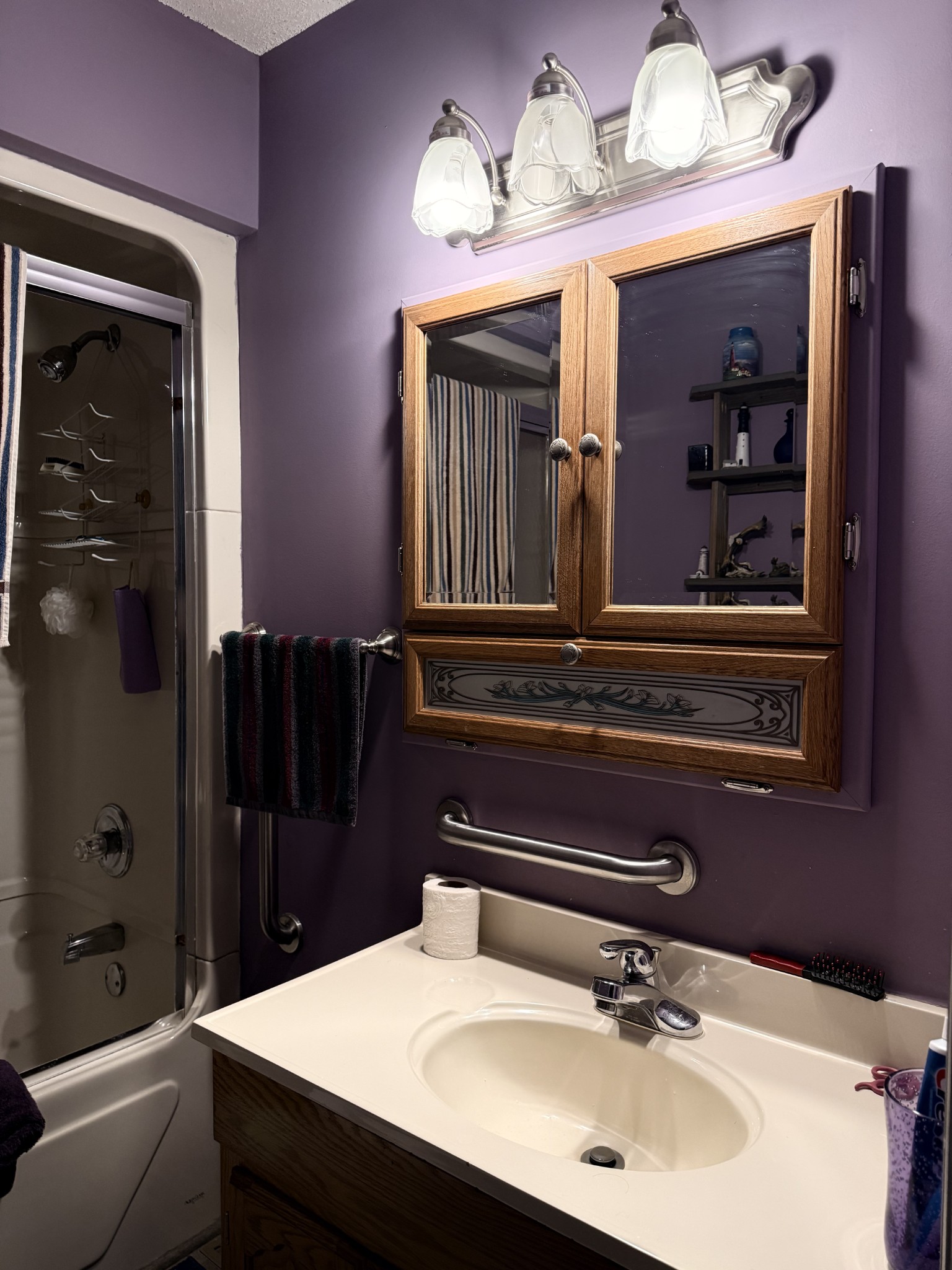 111 Gentry Street Tullahoma, TN 37388 - Photo 61 of 66 a bathroom with a sink and a mirror