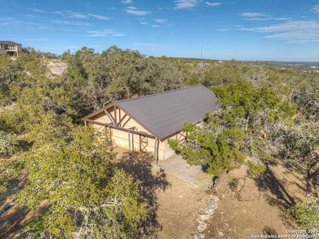1022 Ranger Ridge New Braunfels, TX 78132 - Photo 3 of 15 a view of a yard with a house in the background