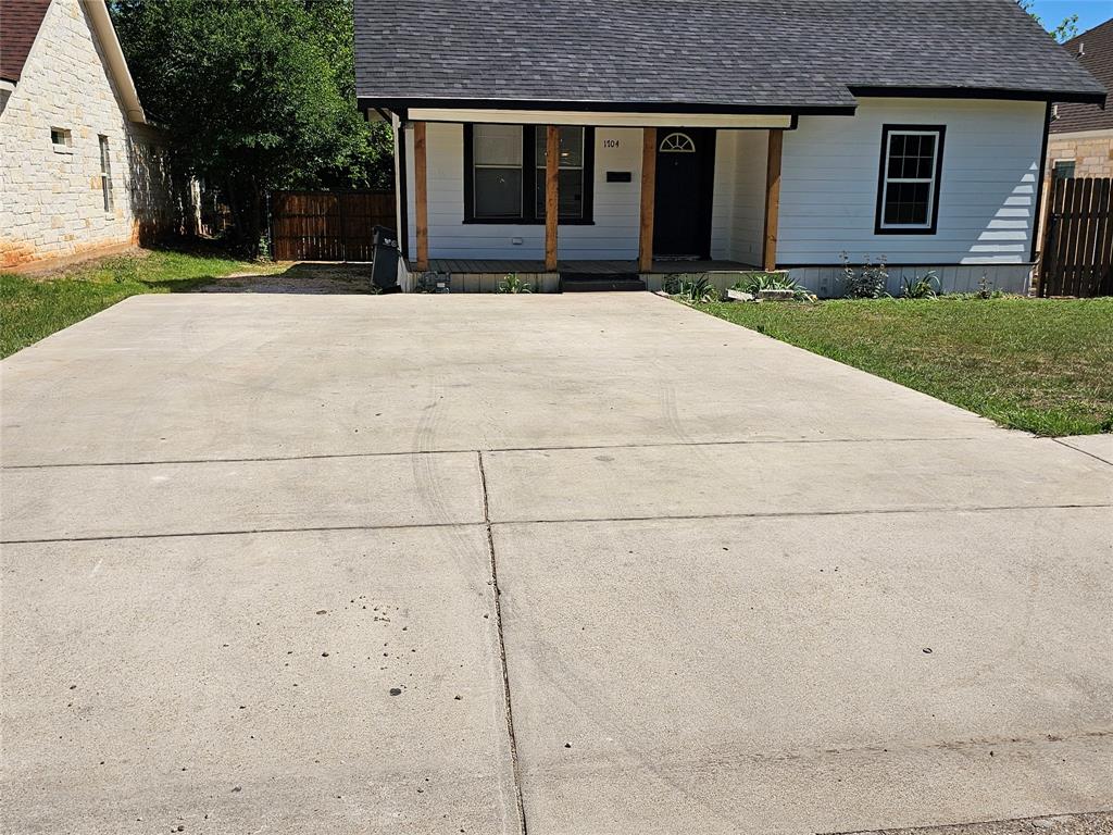 1704 Proctor Avenue Waco, TX 76708 - Photo 4 of 23 front view of house with a yard