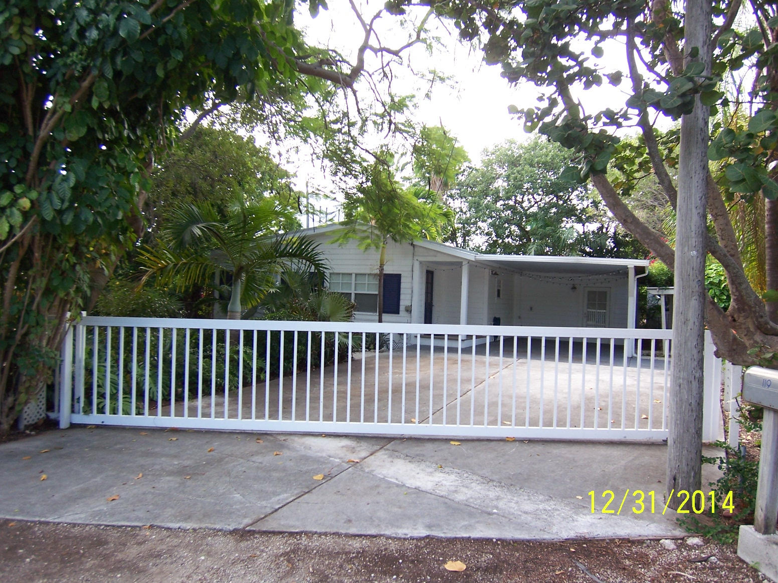 119 Sterling Road Tavernier, FL 33070 - Photo 8 of 16 Driveway Gate at the front of 119 Sterli