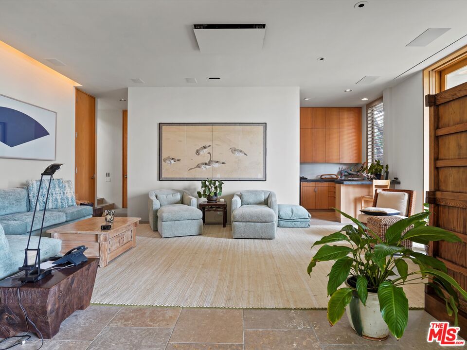 31280 Broad Beach Road Malibu, CA 90265 - Photo 21 of 43 a living room with furniture and a large window