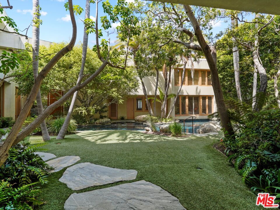 31280 Broad Beach Road Malibu, CA 90265 - Photo 39 of 43 a view of a house with backyard and sitting area