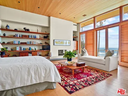 a bed room with a bed and a couch