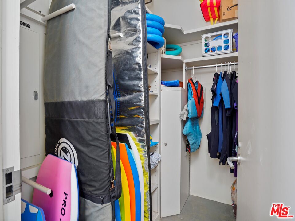 31280 Broad Beach Road Malibu, CA 90265 - Photo 41 of 43 a view of walk in closet with clothes