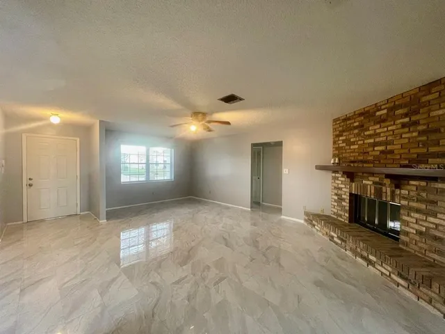 a view of a livingroom with a fireplace