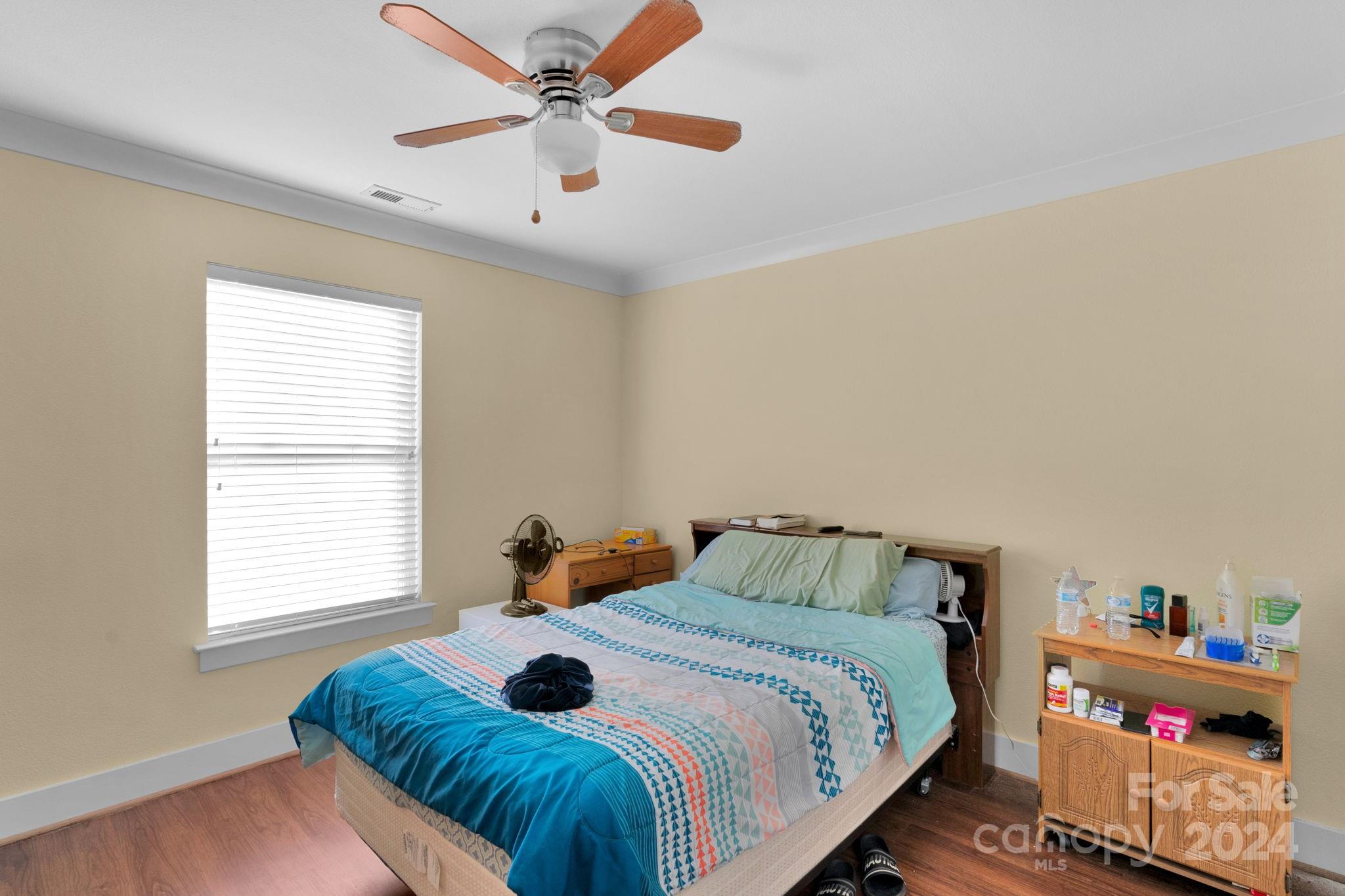 738 Sinclair Drive Monroe, NC 28112 - Photo 19 of 33 a bedroom with a bed and a window