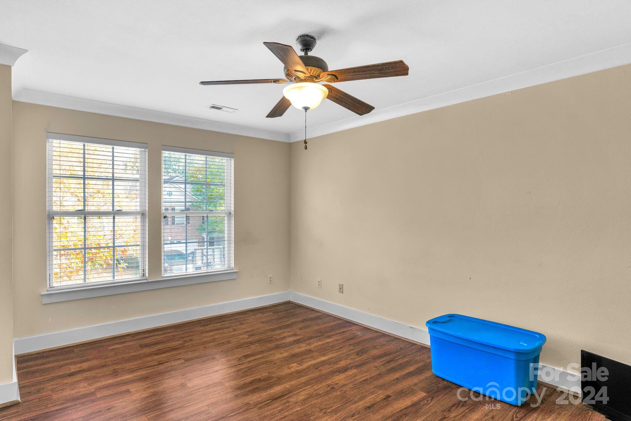 738 Sinclair Drive Monroe, NC 28112 - Photo 21 of 33 a view of an empty room with wooden floor and a window